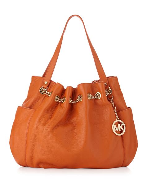 michael kors jet set small travel tote tangerine|michael kors bag with airplanes.